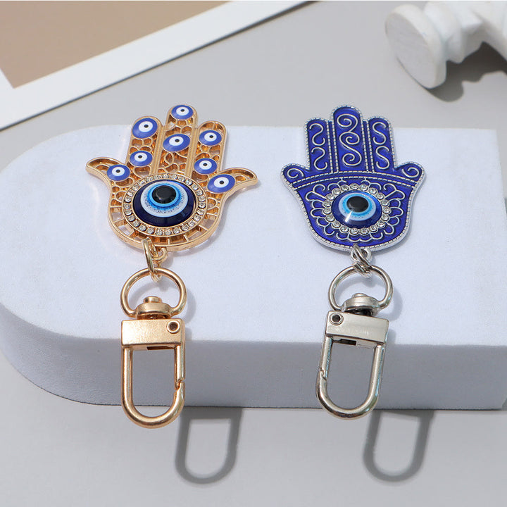Ciondolo a forma di chiave Hamsa con occhio di Allah e strass intarsiati, Olivenorma - image 5