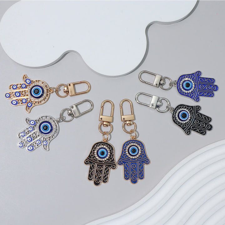 Ciondolo a forma di chiave Hamsa con occhio di Allah e strass intarsiati, Olivenorma - image 6
