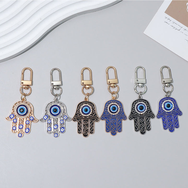 Ciondolo a forma di chiave Hamsa con occhio di Allah e strass intarsiati, Olivenorma - image 2