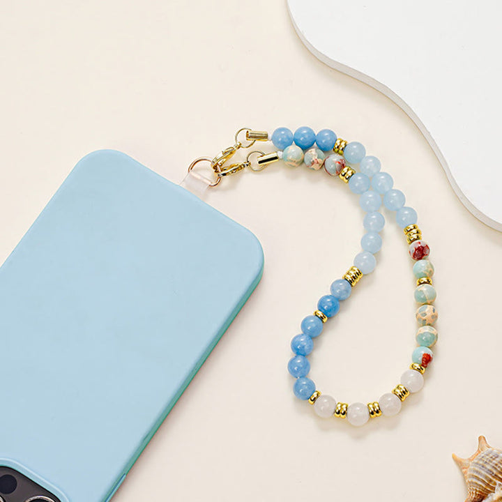 Ciondolo per cellulare Olivenorma, delicato, lucido e con perline, staccabile, alla moda. - Apatite blu, acquamarina e agalmatolite - image 0