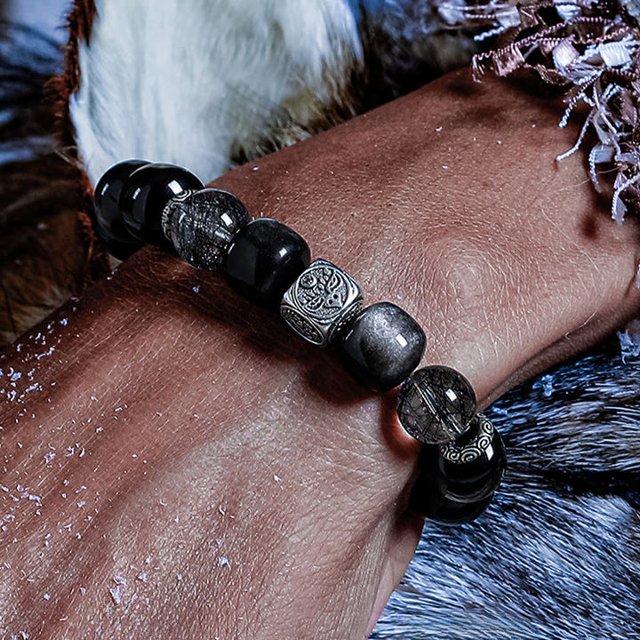 Bracciale Olivenorma con ciondoli incisi in ossidiana argentata e rutilato di quarzo nero. - image 1
