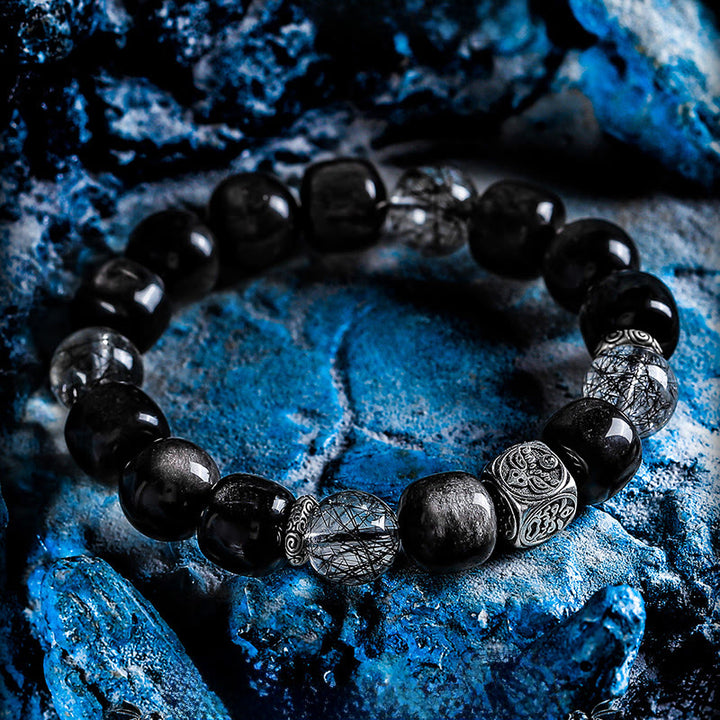 Bracciale Olivenorma con ciondoli incisi in ossidiana argentata e rutilato di quarzo nero. - image 2