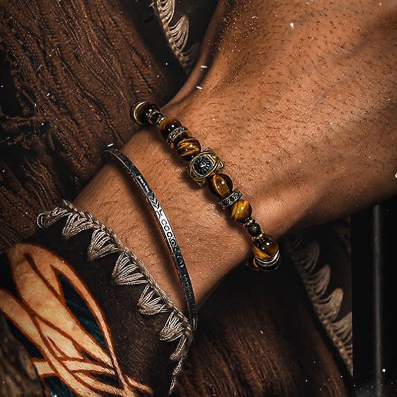 Bracciale Olivenorma con perline incise in occhio di tigre e ossidiana dorata con simbolo del sole. - image 3