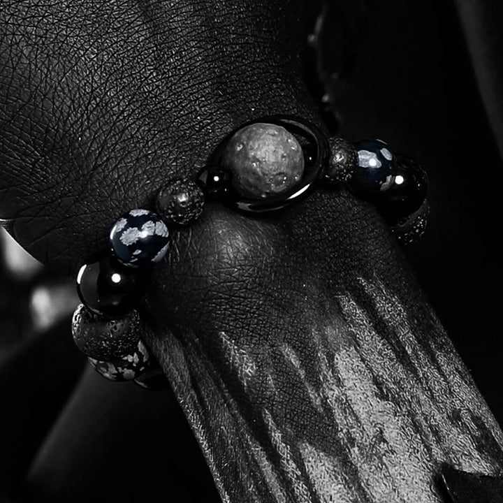 Bracciale Olivenorma con ciondoli a forma di pianeta in pietra lavica e ossidiana - image 4