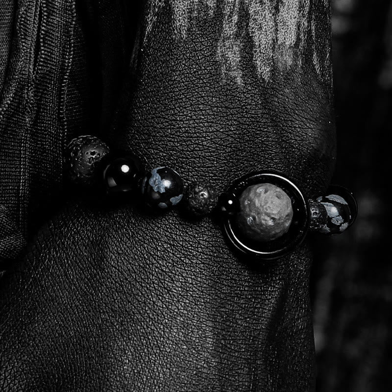 Bracciale Olivenorma con ciondoli a forma di pianeta in pietra lavica e ossidiana - image 3