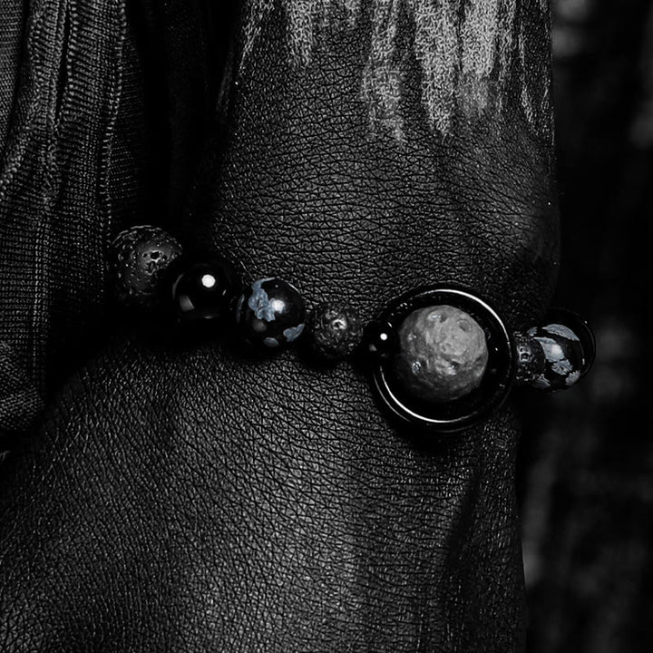 Bracciale Olivenorma con ciondoli a forma di pianeta in pietra lavica e ossidiana - image 3