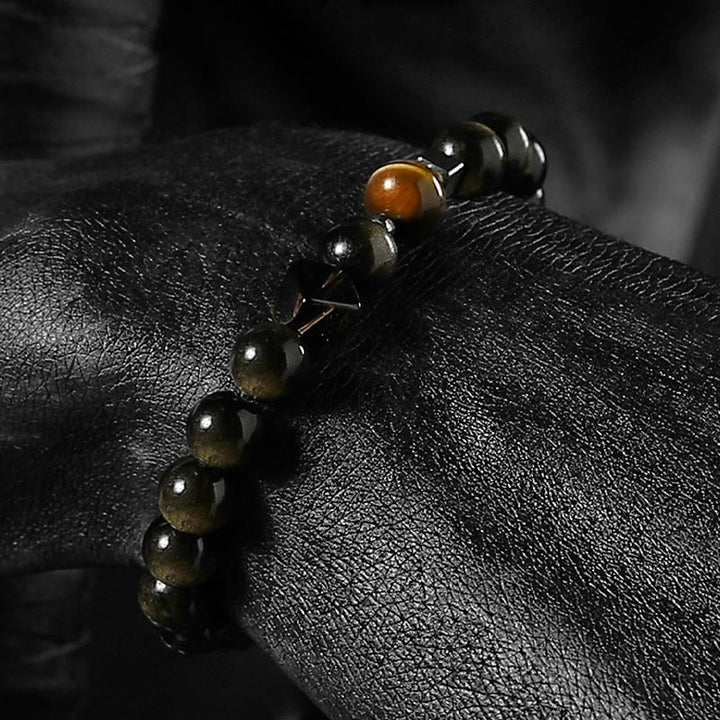 Bracciale protettivo di messa a terra Olivenorma in ossidiana dorata e oro. - image 2