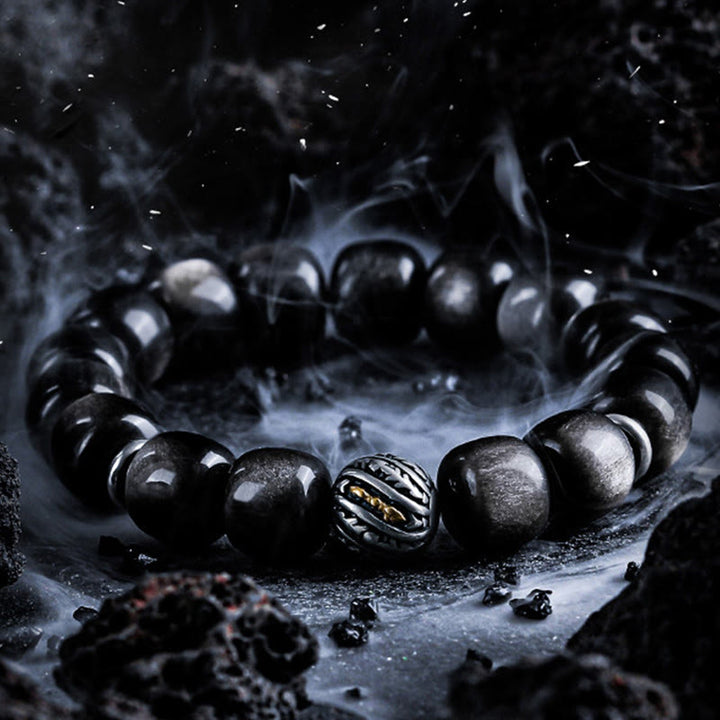 Bracciale Olivenorma con ciondolo a forma di simbolo attorcigliato inciso in ossidiana argentata. - image 2
