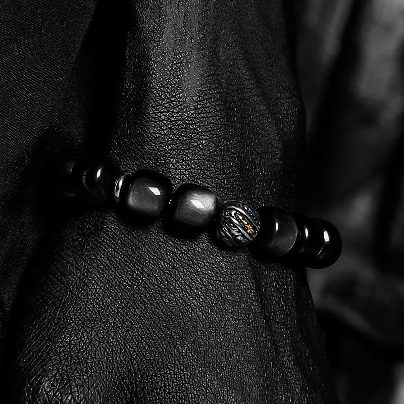 Bracciale Olivenorma con ciondolo a forma di simbolo attorcigliato inciso in ossidiana argentata. - image 5