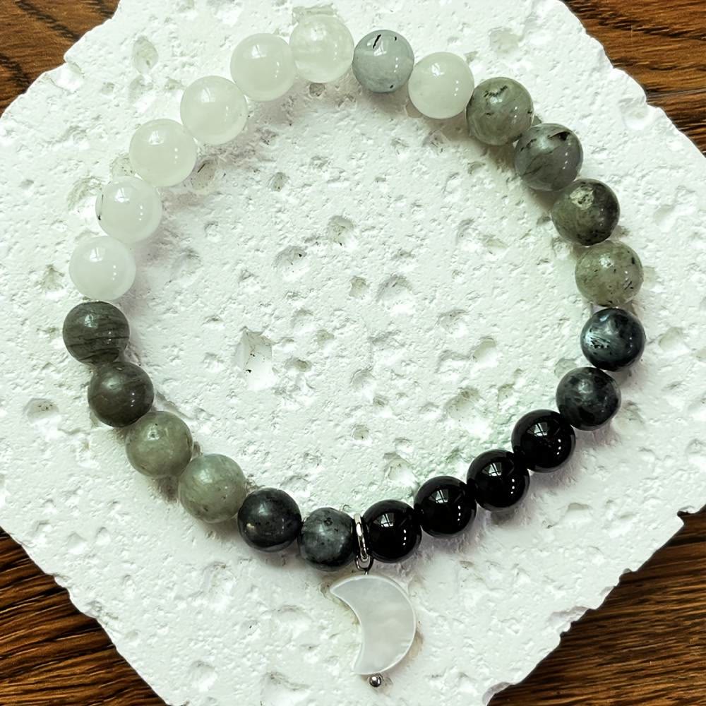 Bracciale Olivenorma con perline di cristallo trasparente, ossidiana, labradorite e pietra di luna nera. - image 3