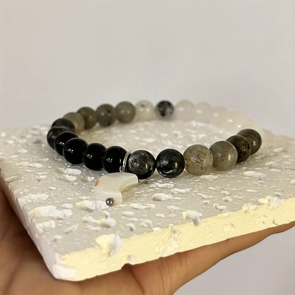 Bracciale Olivenorma con perline di cristallo trasparente, ossidiana, labradorite e pietra di luna nera. - image 5