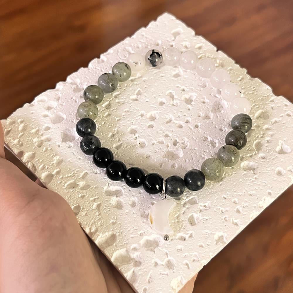 Bracciale Olivenorma con perline di cristallo trasparente, ossidiana, labradorite e pietra di luna nera. - image 6