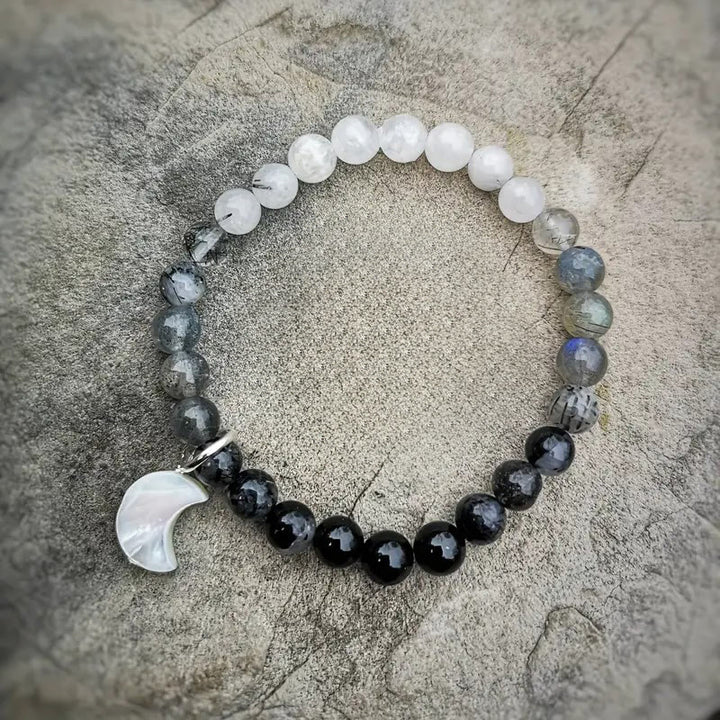 Bracciale Olivenorma con perline di cristallo trasparente, ossidiana, labradorite e pietra di luna nera. - image 2