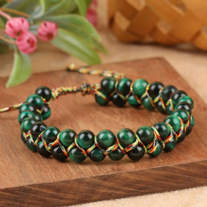 Bracciale Olivenorma Tiger Eye a doppia fila regolabile con cordino intrecciato e perline - image 1