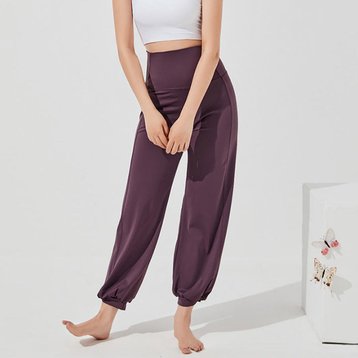 Pantaloni da yoga larghi a vita alta e lunghezza alla caviglia Olivenorma da donna. - image 1