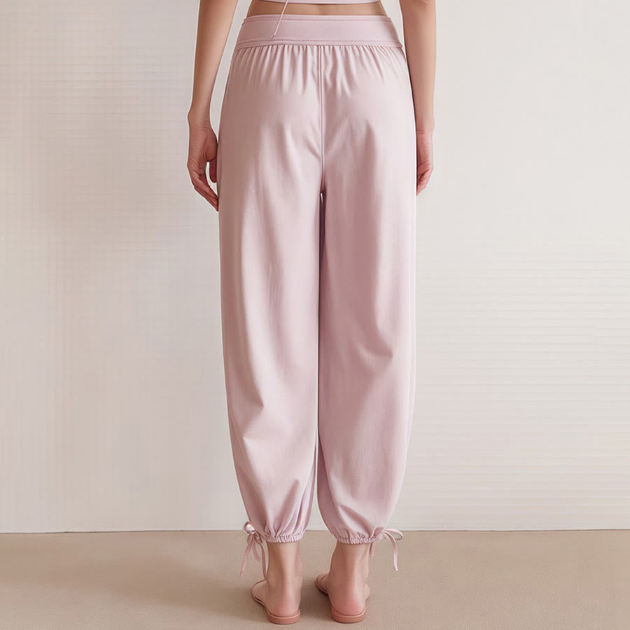 Pantaloni harem da yoga da donna Olivenorma a vita alta, plissettati e con coulisse alla caviglia. - image 10