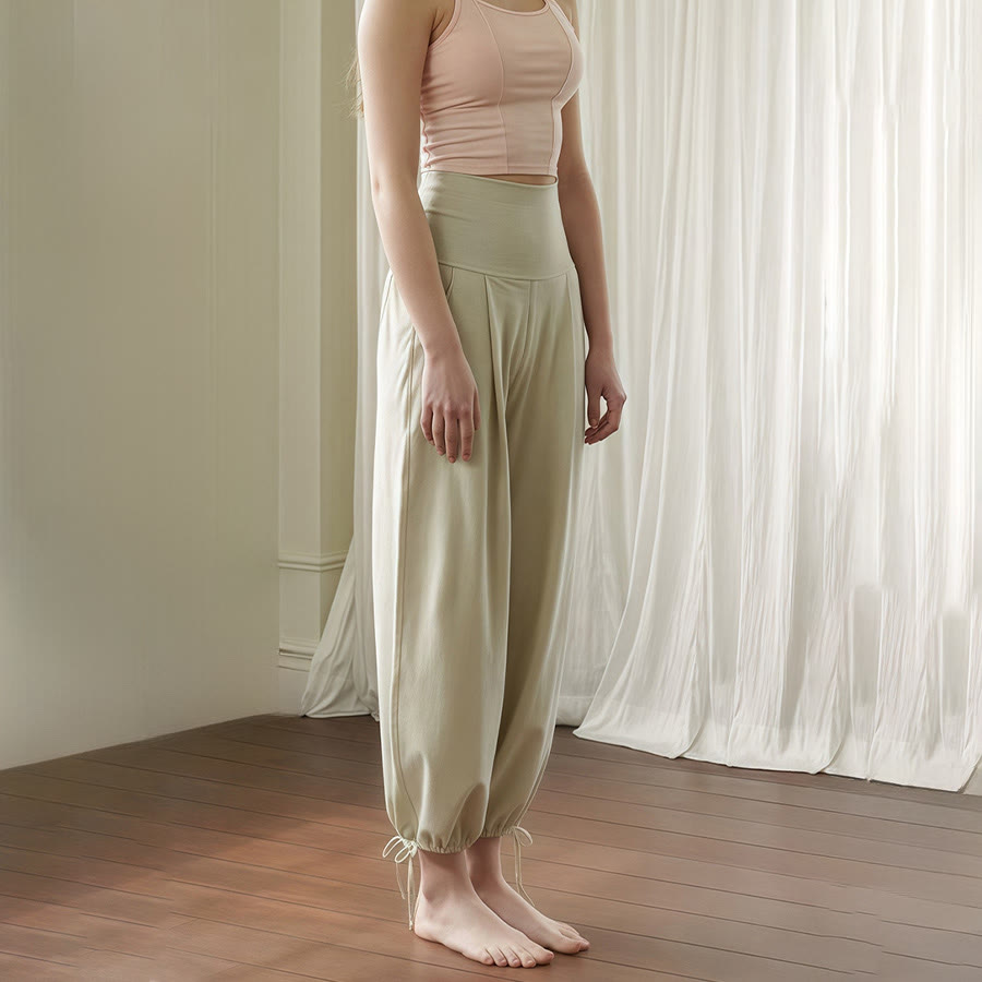 Pantaloni harem da yoga da donna Olivenorma a vita alta, plissettati e con coulisse alla caviglia. - image 6