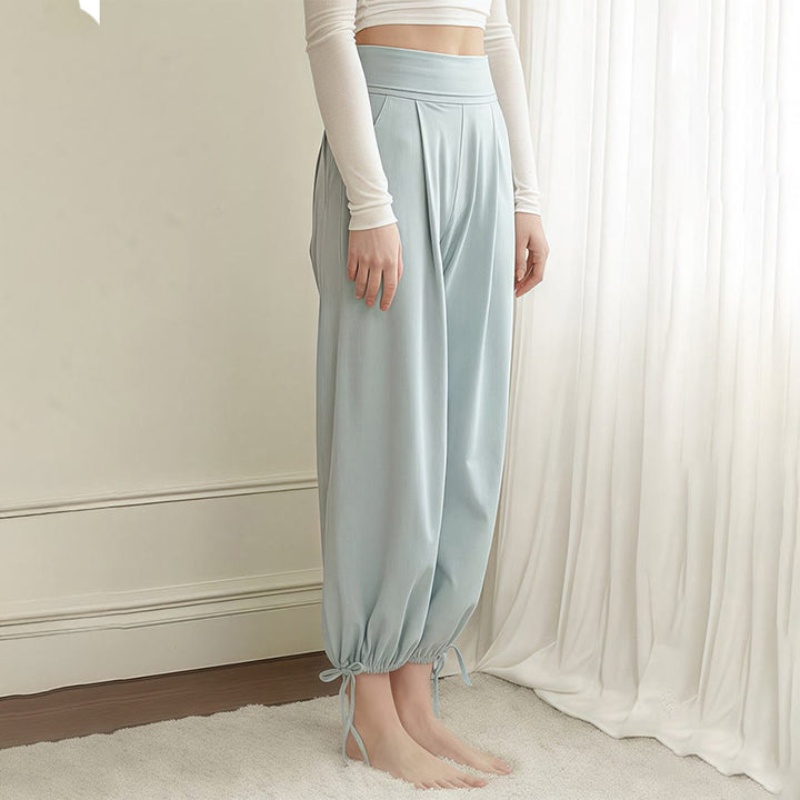 Pantaloni harem da yoga da donna Olivenorma a vita alta, plissettati e con coulisse alla caviglia. - image 3