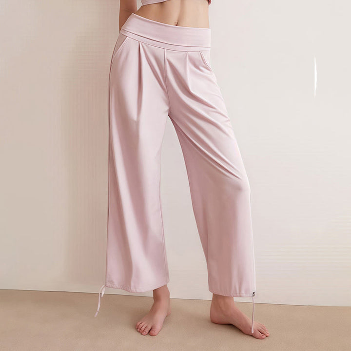 Pantaloni harem da yoga da donna Olivenorma a vita alta, plissettati e con coulisse alla caviglia. - image 8