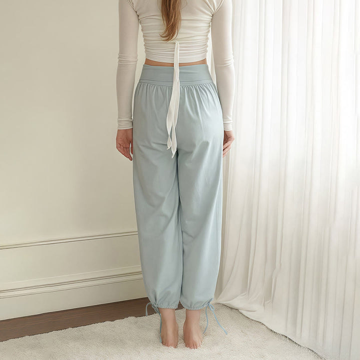 Pantaloni harem da yoga da donna Olivenorma a vita alta, plissettati e con coulisse alla caviglia. - image 2
