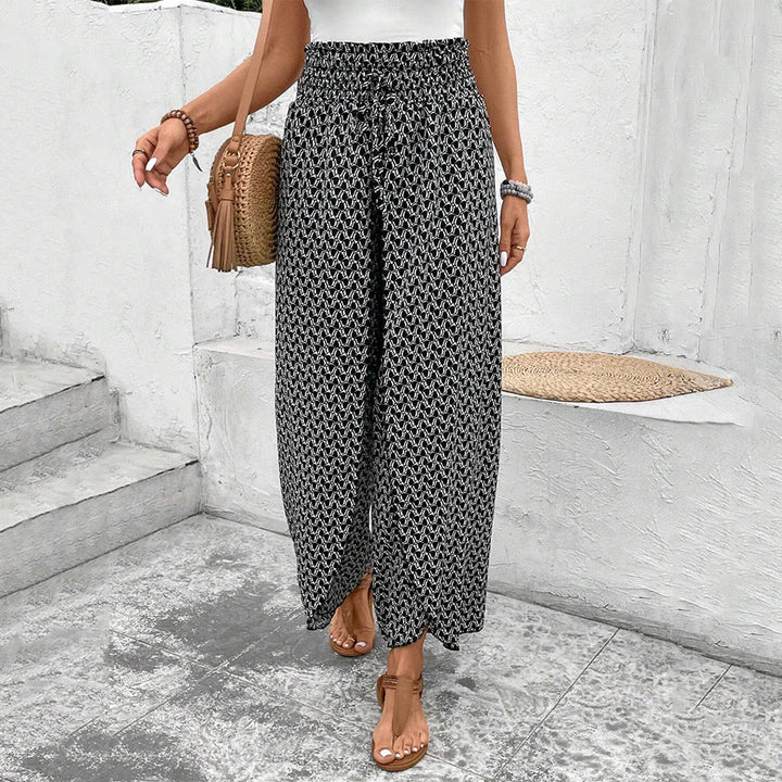 Pantaloni da donna Olivenorma a vita alta con coulisse e gamba larga, con stampa floreale. - image 13