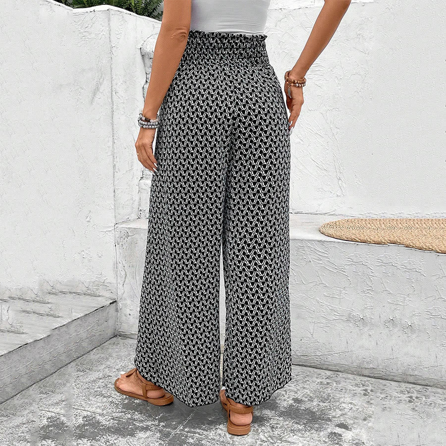 Pantaloni da donna Olivenorma a vita alta con coulisse e gamba larga, con stampa floreale. - image 15