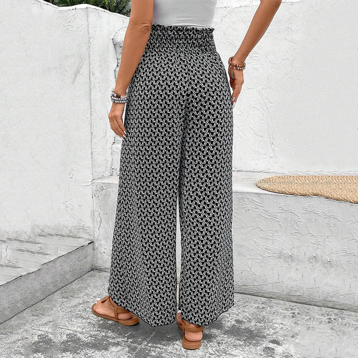 Pantaloni da donna Olivenorma a vita alta con coulisse e gamba larga, con stampa floreale. - image 15