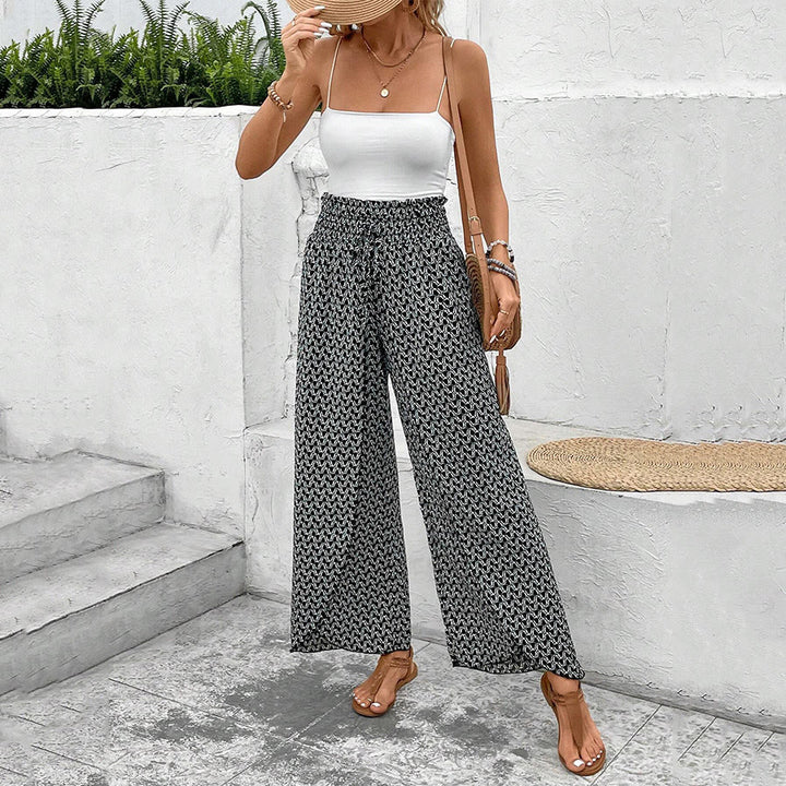 Pantaloni da donna Olivenorma a vita alta con coulisse e gamba larga, con stampa floreale. - image 12