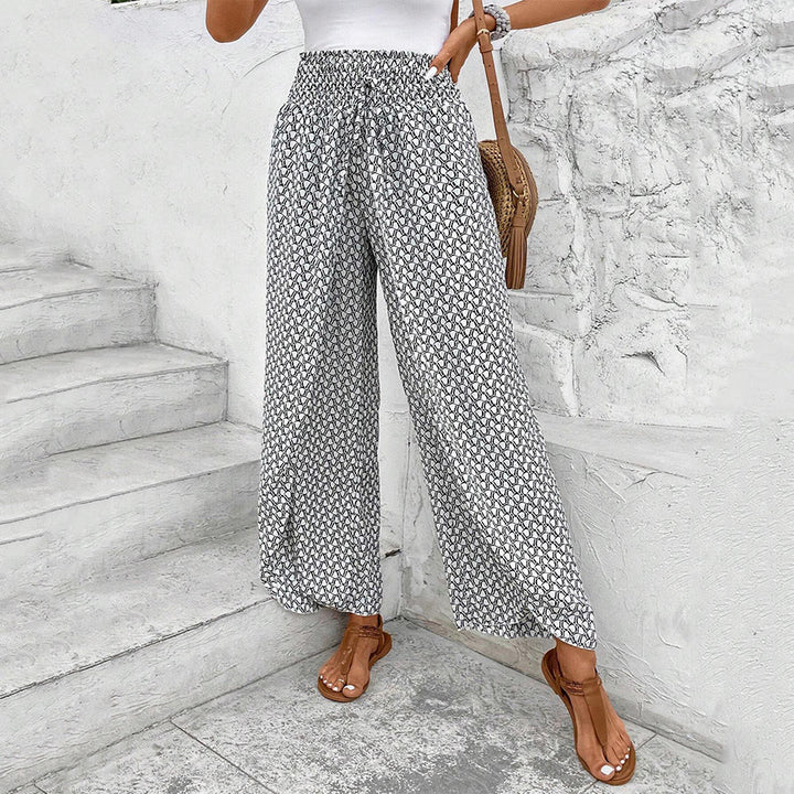 Pantaloni da donna Olivenorma a vita alta con coulisse e gamba larga, con stampa floreale. - image 10