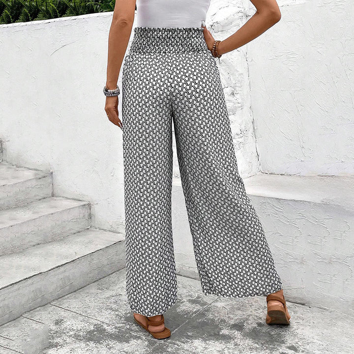 Pantaloni da donna Olivenorma a vita alta con coulisse e gamba larga, con stampa floreale. - image 8