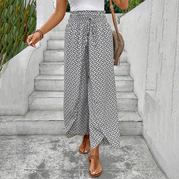 Pantaloni da donna Olivenorma a vita alta con coulisse e gamba larga, con stampa floreale. - image 7