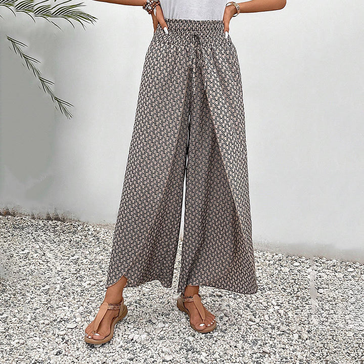 Pantaloni da donna Olivenorma a vita alta con coulisse e gamba larga, con stampa floreale. - image 24