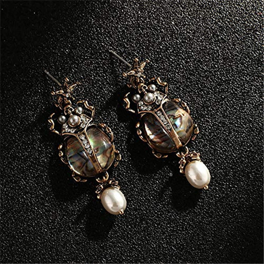 Orecchini pendenti vintage Olivenorma con stella e scarabeo e perle - image 8