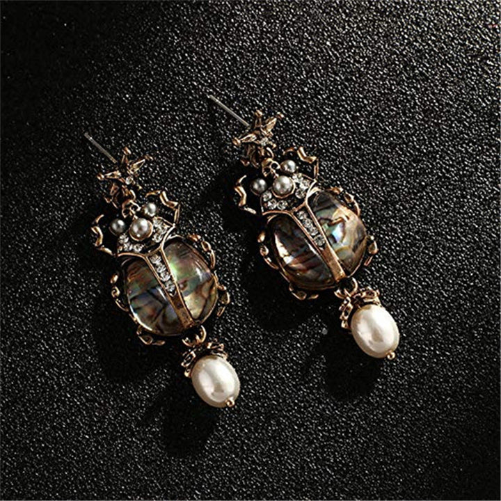 Orecchini pendenti vintage Olivenorma con stella e scarabeo e perle - image 8