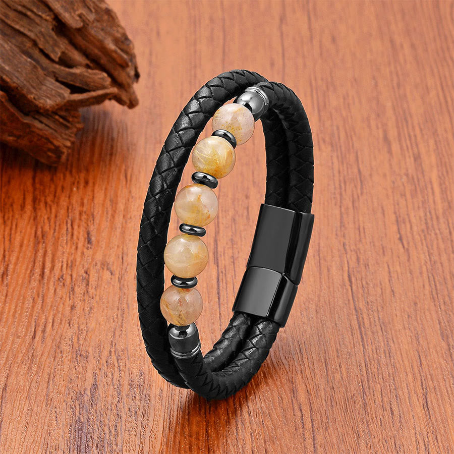 Bracciale Olivenorma in pelle a doppia treccia e pietra naturale, ispirato all'etnia. - Quarzo rutilato dorato Chiusura color canna di fucile - 23 cm - image 2