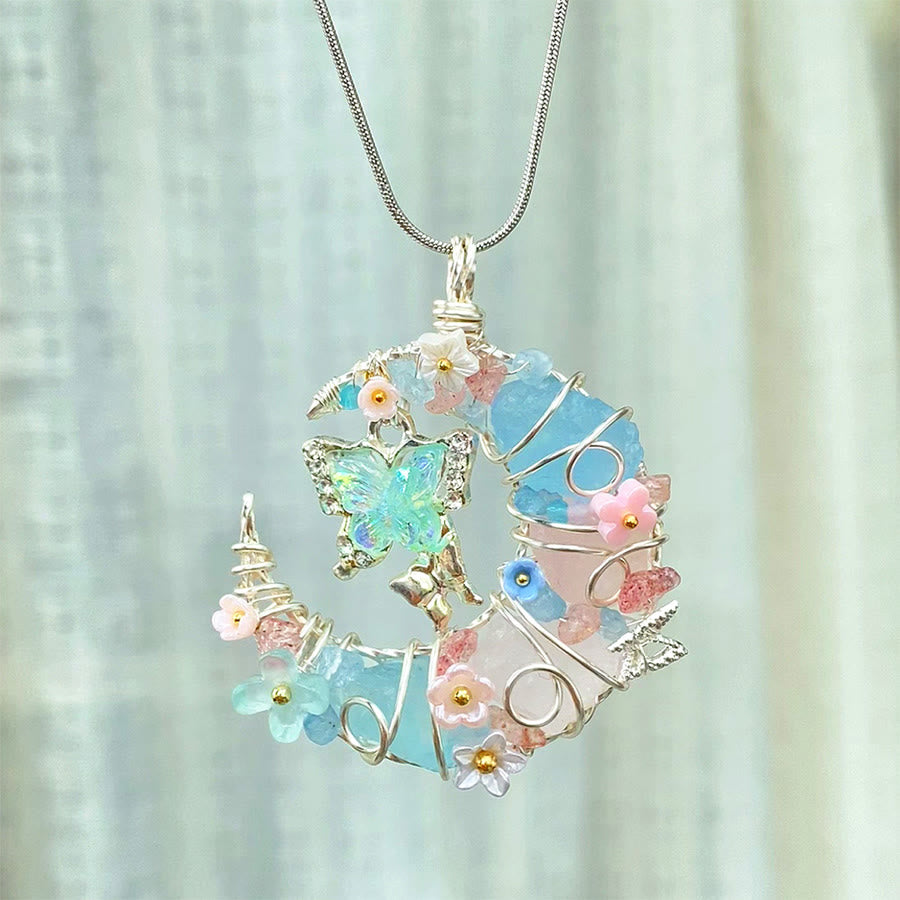 Collana Olivenorma con acquamarina blu, quarzo rosa, mezzaluna, farfalla e fiori - image 1