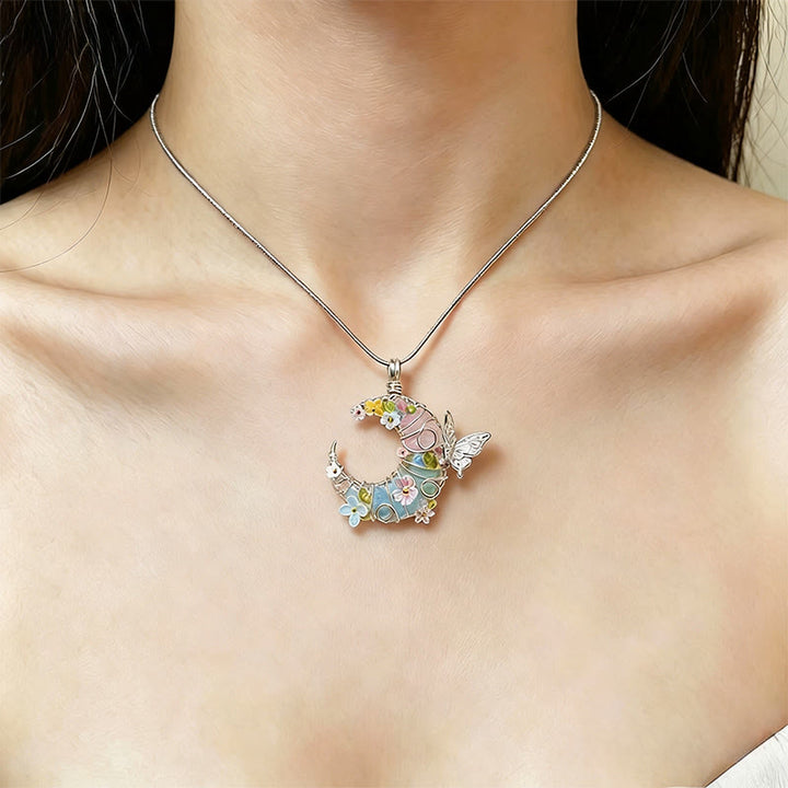 Collana Olivenorma fatta a mano con mezzaluna avvolta in filo metallico, quarzo rosa e acquamarina, con farfalle e fiori. - image 2