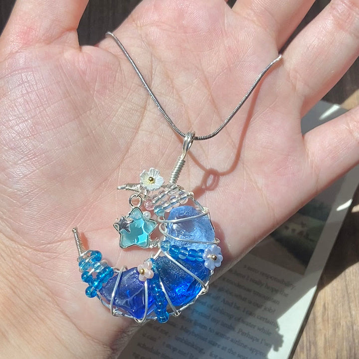 Collana in argento con ciondolo a mezzaluna Olivenorma Raw Crystal e decorazioni a stella e fiore . Collana in argento con ciondolo a mezzaluna e decorazioni a stella e fiore. - image 4