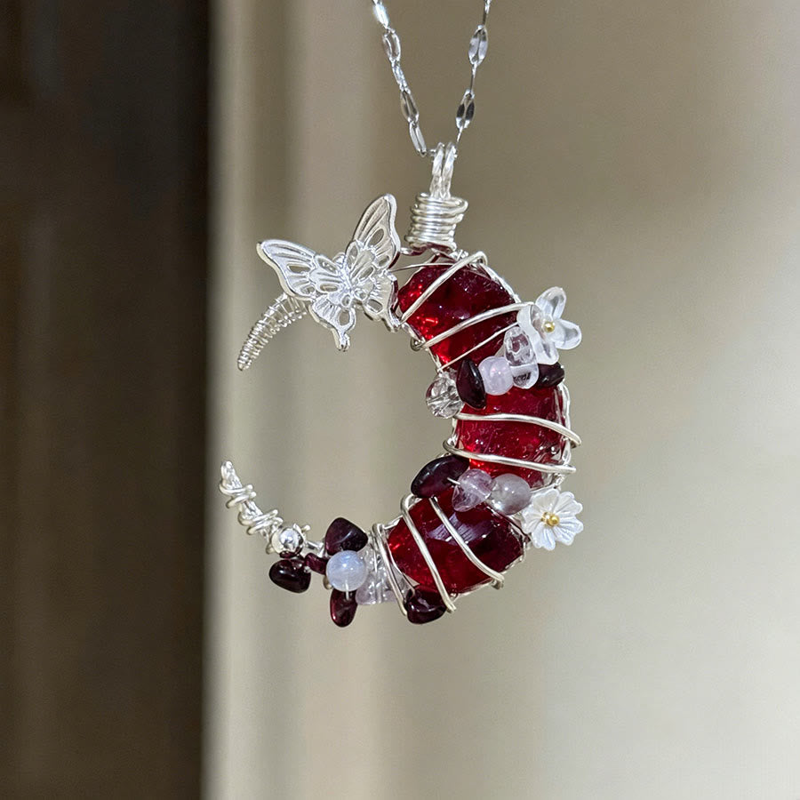 Collana con ciondolo a mezzaluna in cristallo Olivenorma e dettagli a farfalla e stella. - image 1