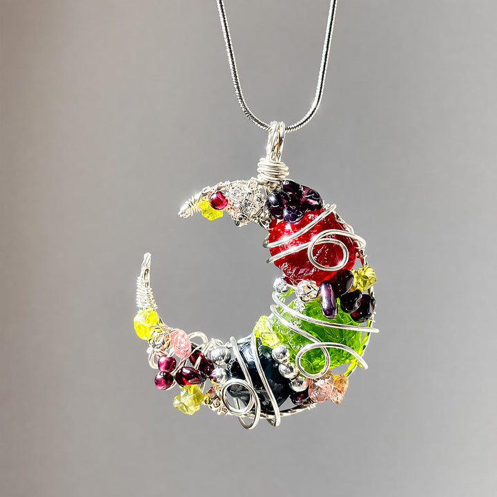 Collana Olivenorma con mezzaluna stravagante in ossidiana e vetro misto, avvolta in filo metallico. - Ossidiana e vetro misto - image 0
