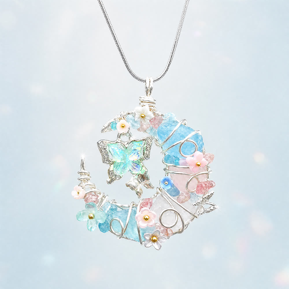 Collana Olivenorma con acquamarina blu, quarzo rosa, mezzaluna, farfalla e fiori - Acquamarina, quarzo rosa e quarzo trasparente - image 0