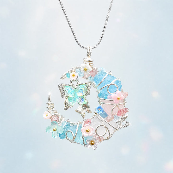 Collana Olivenorma con acquamarina blu, quarzo rosa, mezzaluna, farfalla e fiori - Acquamarina, quarzo rosa e quarzo trasparente - image 0