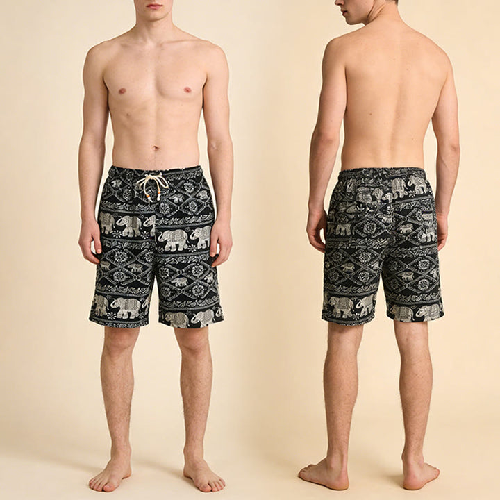 Pantaloncini da uomo Olivenorma con stampa di elefanti bohémien su base nera e bianca, perfetti per vacanze e spiaggia. - image 4