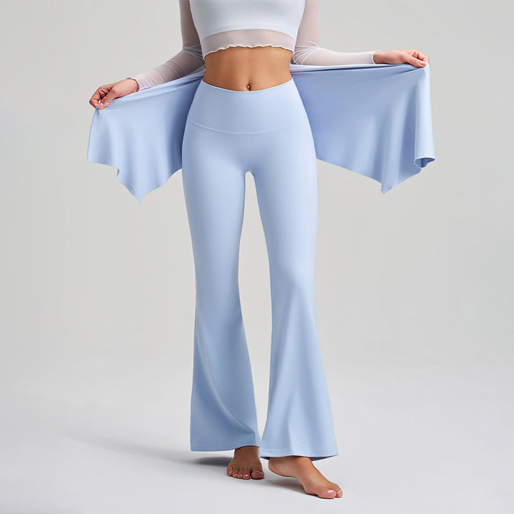 Pantaloni da yoga da donna Olivenorma con gonna asimmetrica, dettagli a bottoni, vita alta e taglio svasato. - image 4