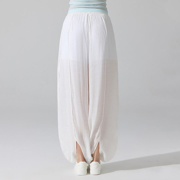 Pantaloni da yoga da donna Olivenorma a vita alta con elastico in vita e texture stropicciata, modello harem ampio. - image 8