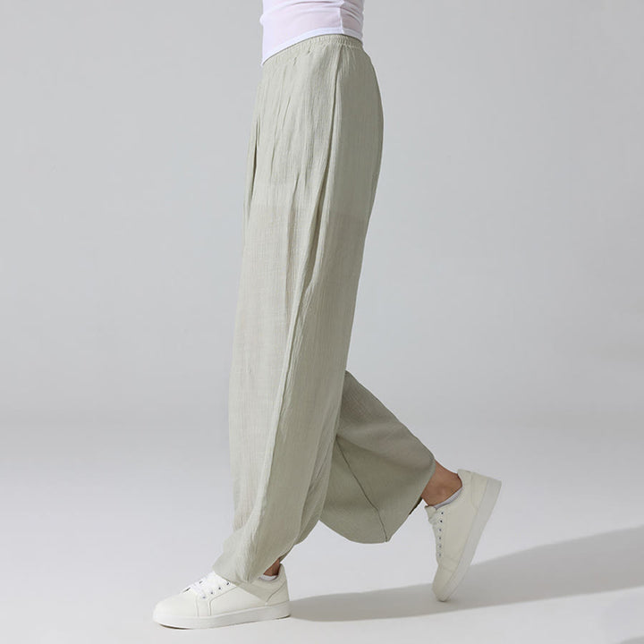 Pantaloni da yoga da donna Olivenorma a vita alta con elastico in vita e texture stropicciata, modello harem ampio. - image 12
