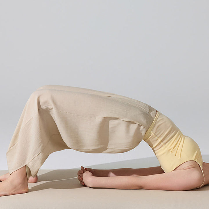 Pantaloni da yoga da donna Olivenorma a vita alta con elastico in vita e texture stropicciata, modello harem ampio. - image 5
