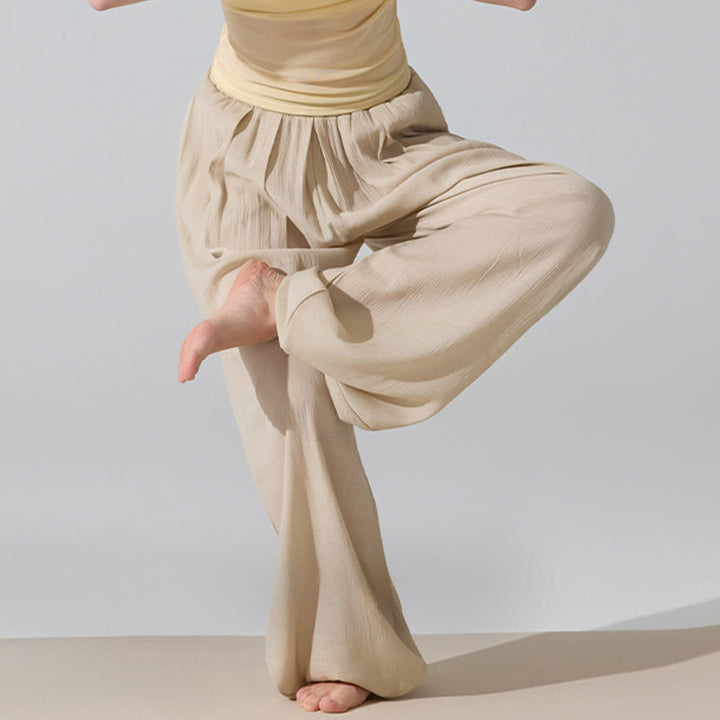 Pantaloni da yoga da donna Olivenorma a vita alta con elastico in vita e texture stropicciata, modello harem ampio. - image 2