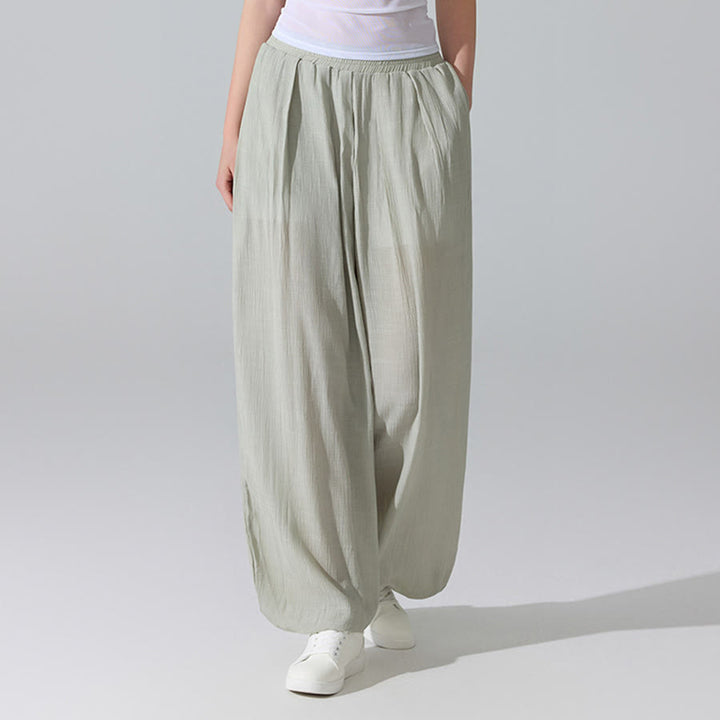 Pantaloni da yoga da donna Olivenorma a vita alta con elastico in vita e texture stropicciata, modello harem ampio. - Verde - L - image 11