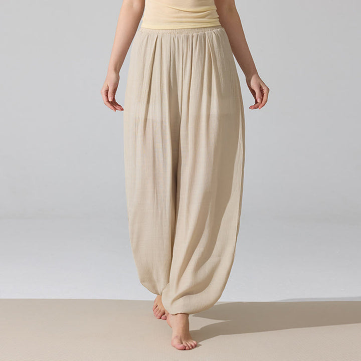 Pantaloni da yoga da donna Olivenorma a vita alta con elastico in vita e texture stropicciata, modello harem ampio. - Albicocca - L - image 1
